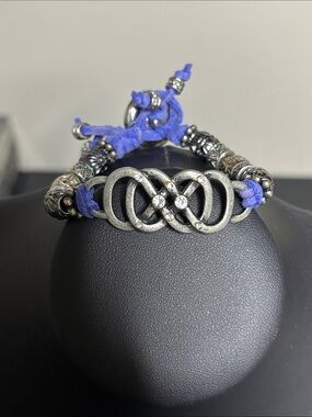 Silver Infinity Knot Bracelet Blue Leather Cord Rhinestone Accents